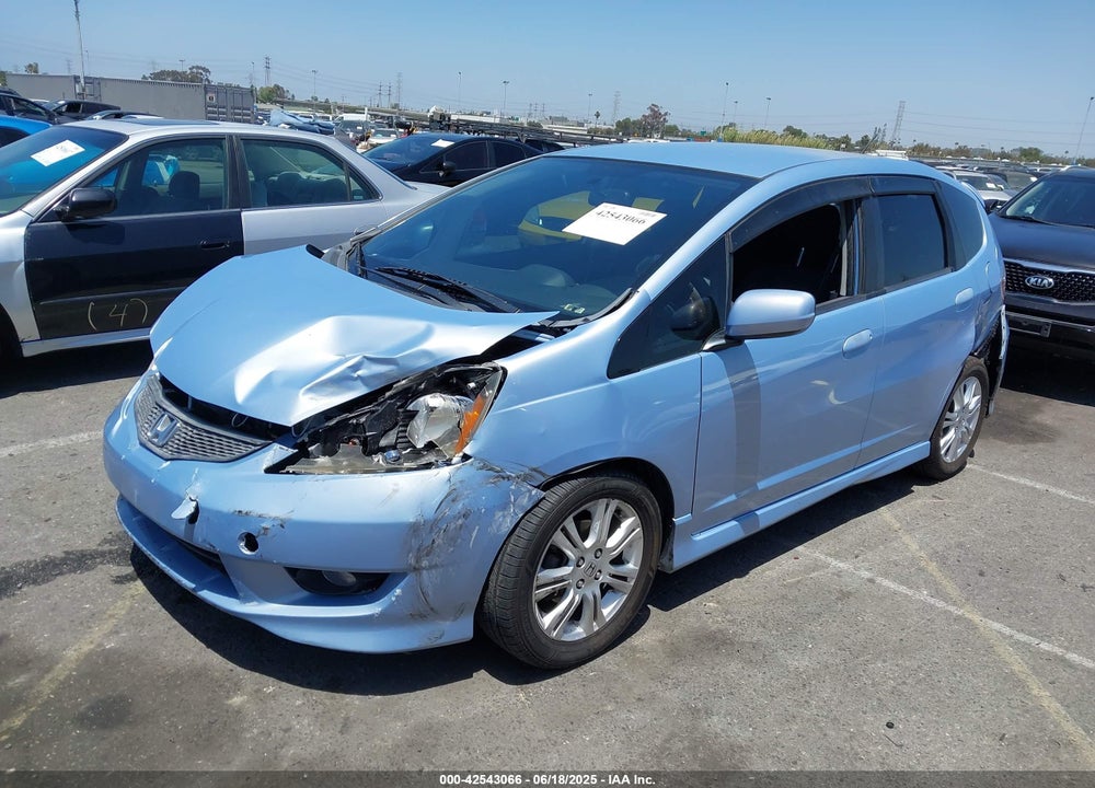 2009 HONDA FIT VIN: JHMGE88439S007689