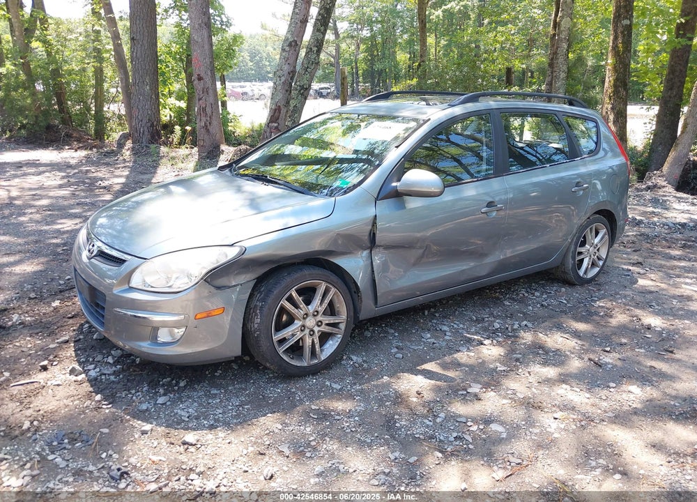 2010 HYUNDAI ELANTRA TOURING VIN: KMHDC8AE3AU050785