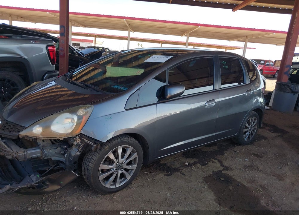 2012 HONDA FIT VIN: JHMGE8H57CC006393