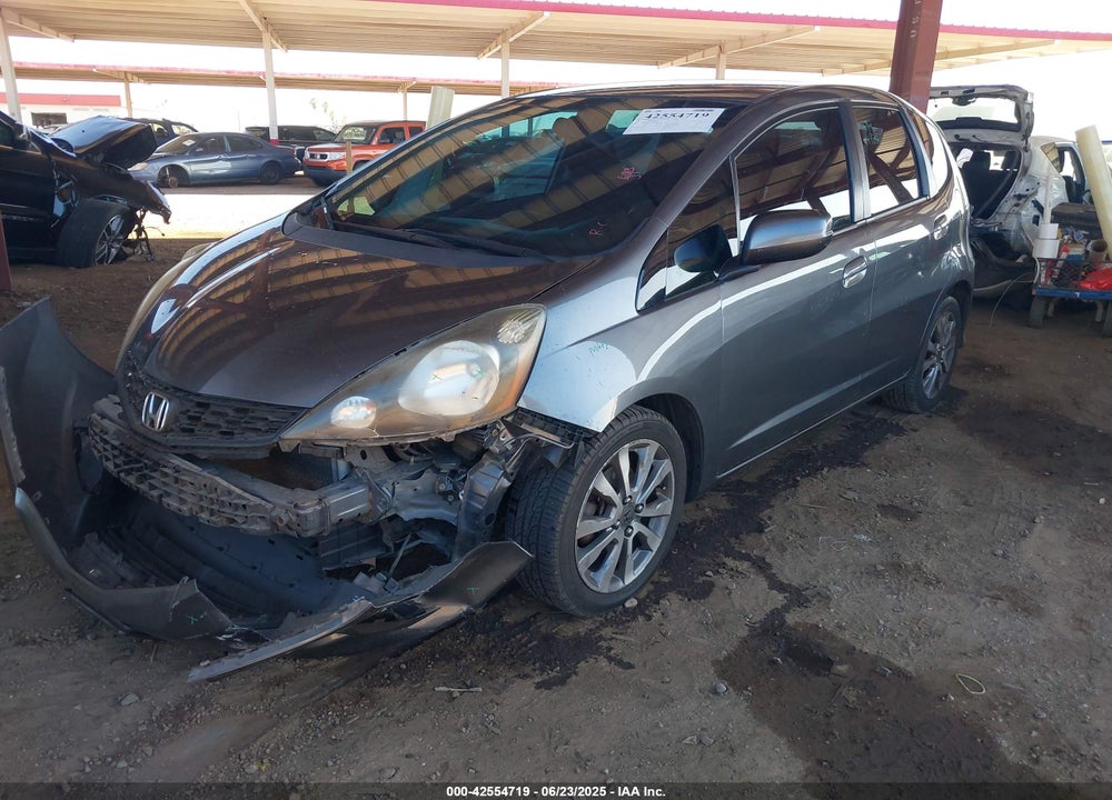 2012 HONDA FIT VIN: JHMGE8H57CC006393