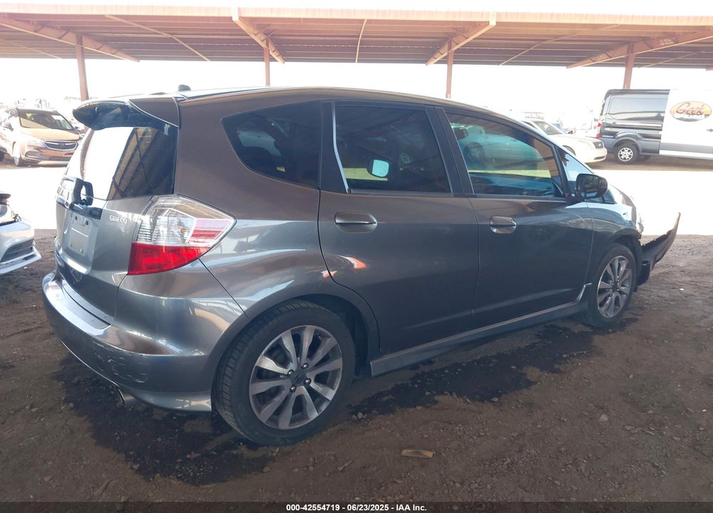 2012 HONDA FIT VIN: JHMGE8H57CC006393