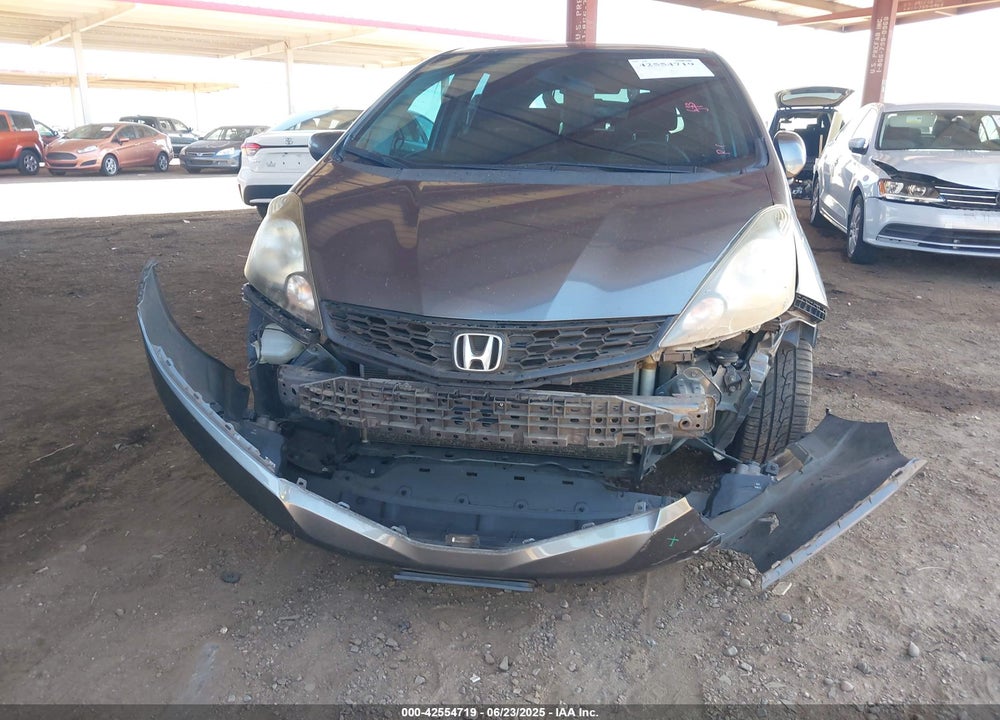 2012 HONDA FIT VIN: JHMGE8H57CC006393