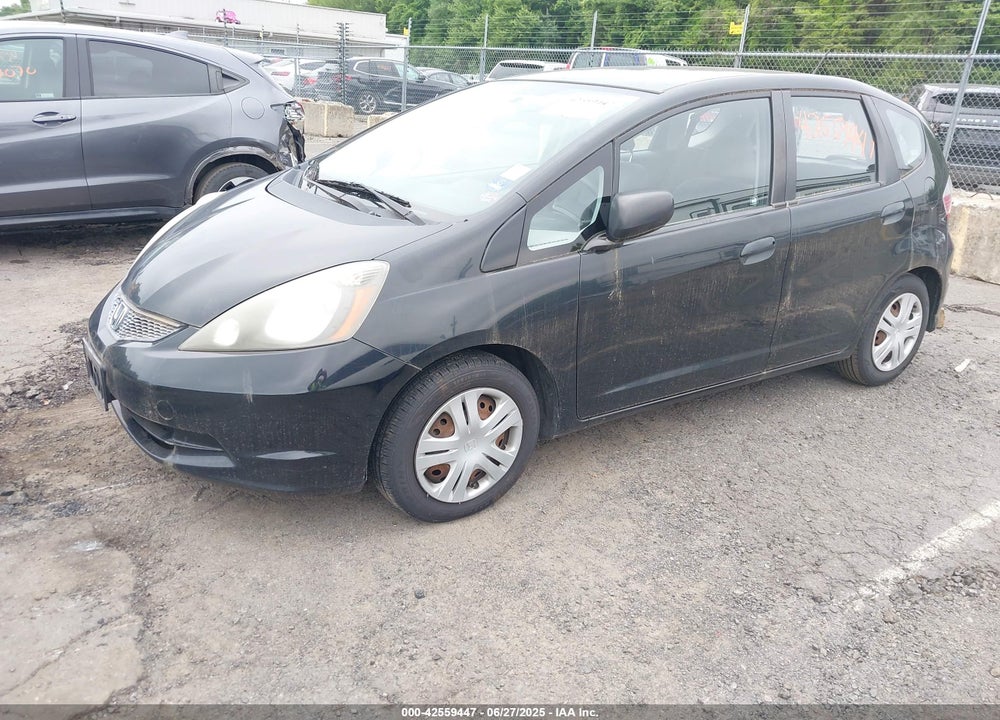 2009 HONDA FIT VIN: JHMGE88269S073491