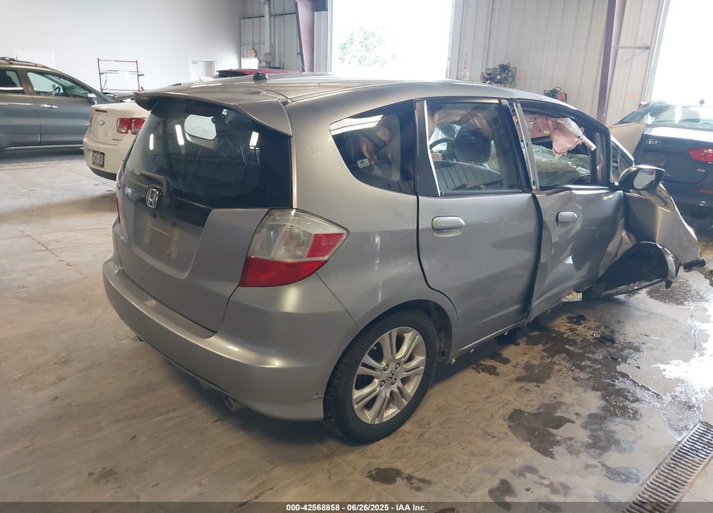 2009 HONDA FIT VIN: JHMGE87459S021546