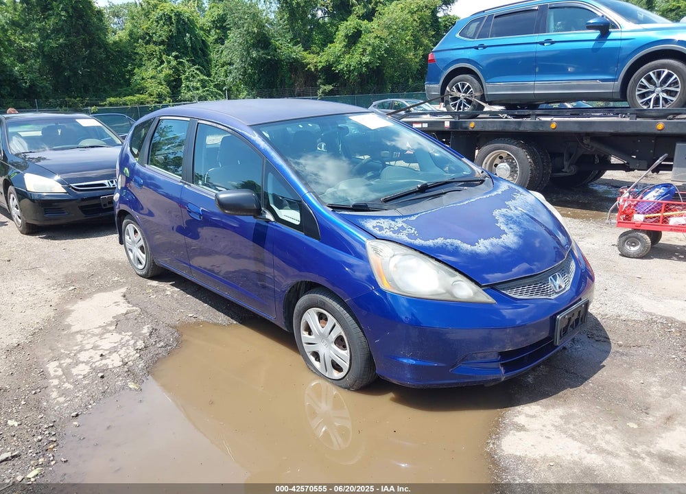 2009 HONDA FIT VIN: JHMGE87259S053475