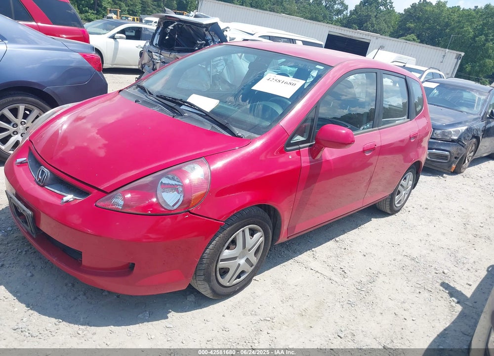 2008 HONDA FIT VIN: JHMGD384X8S073855