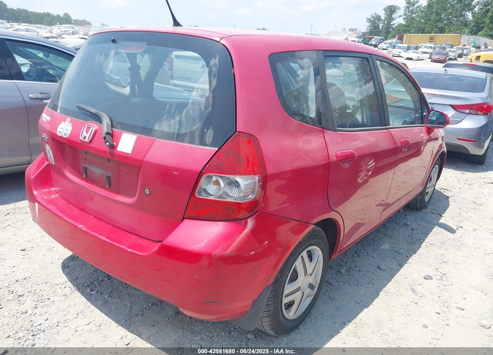 2008 HONDA FIT VIN: JHMGD384X8S073855