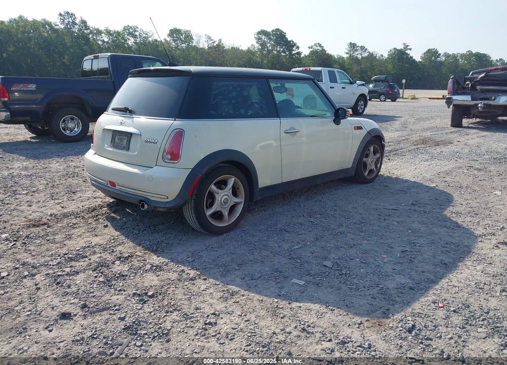 2006 MINI COOPER VIN: WMWRC33506TK18077
