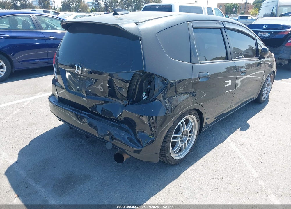 2012 HONDA FIT VIN: JHMGE8H57CC031522