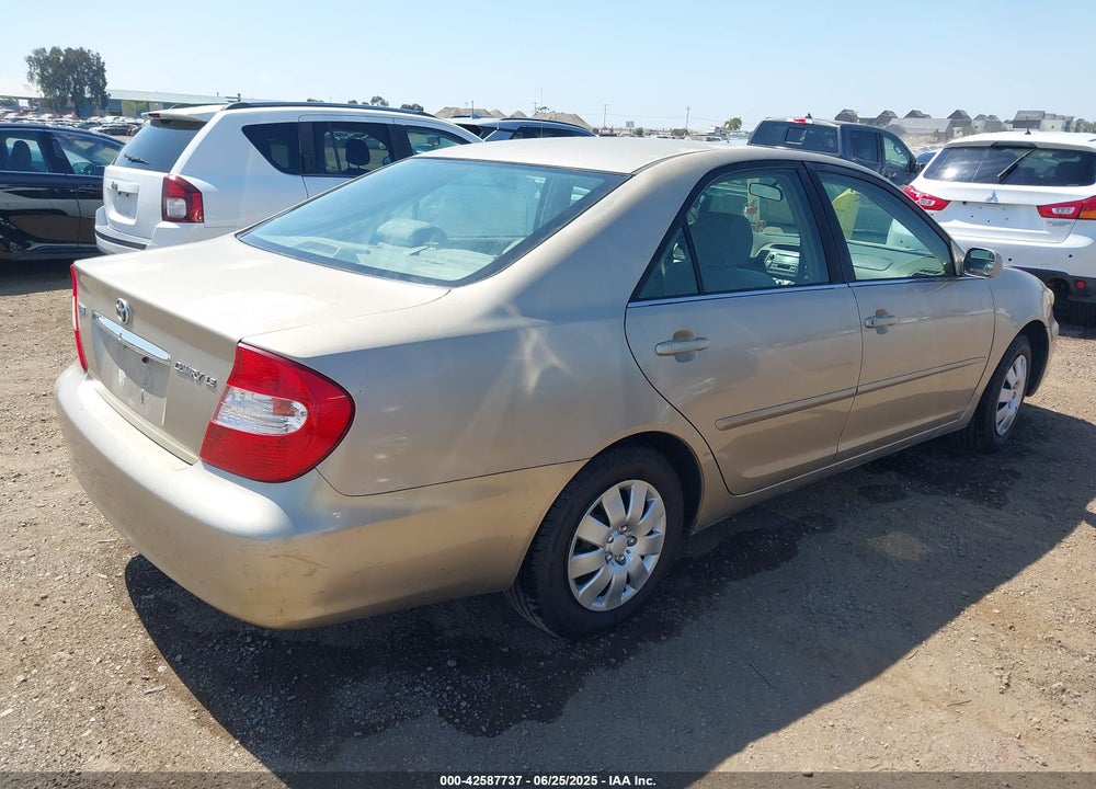 2002 TOYOTA CAMRY LE VIN: JTDBE32K520105405
