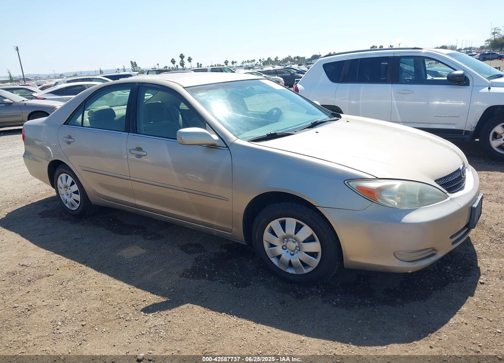 2002 TOYOTA CAMRY LE VIN: JTDBE32K520105405