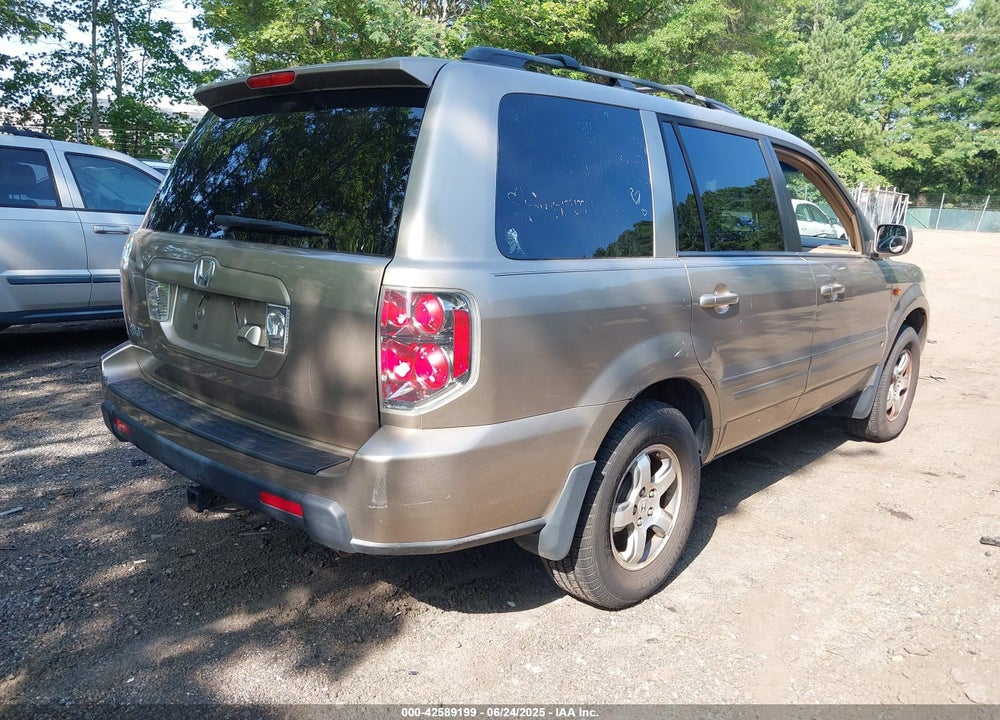 2007 HONDA PILOT EX-L VIN: 5FNYF287X7B000940