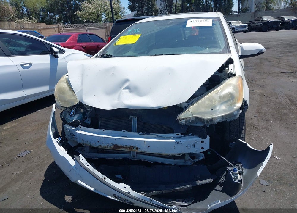 2012 TOYOTA PRIUS C THREE VIN: JTDKDTB32C1004670