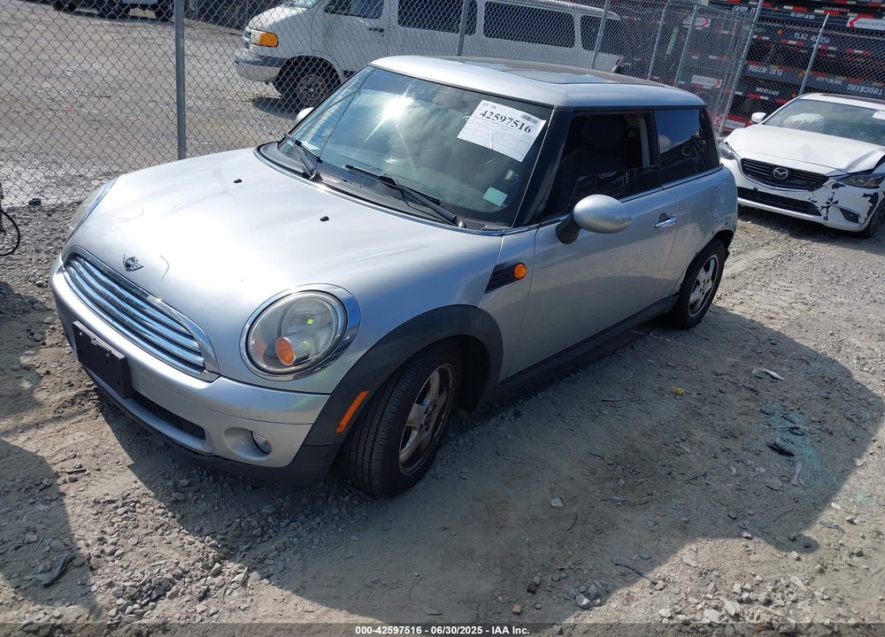 2010 MINI COOPER VIN: WMWMF3C52ATZ21447