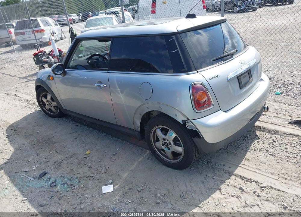 2010 MINI COOPER VIN: WMWMF3C52ATZ21447