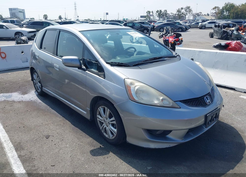 2009 HONDA FIT VIN: JHMGE88499S008698