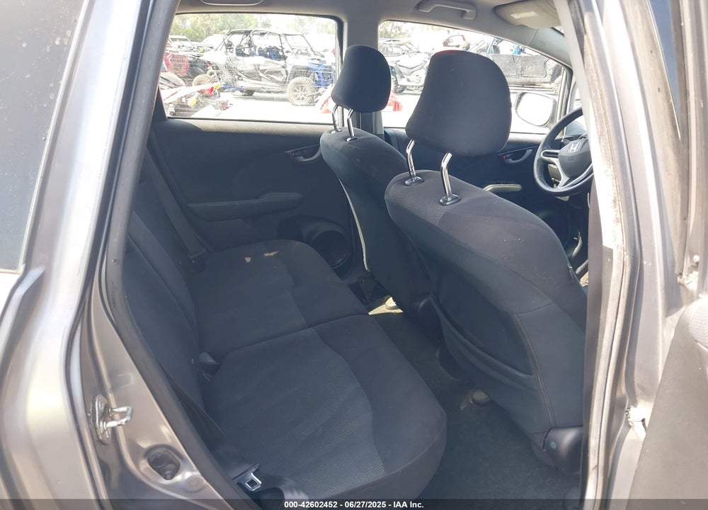2009 HONDA FIT VIN: JHMGE88499S008698