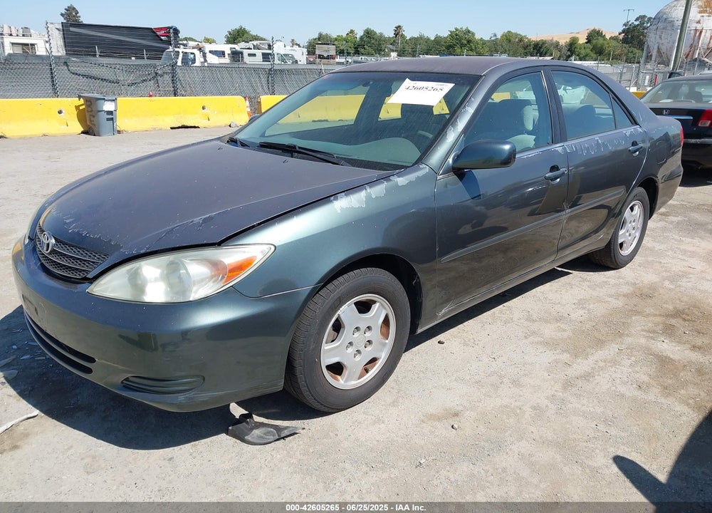 2003 TOYOTA CAMRY LE VIN: 4T1BF30K93U554432