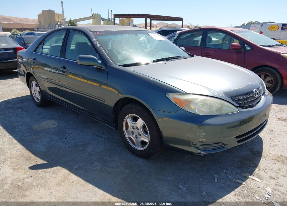 2003 TOYOTA CAMRY LE VIN: 4T1BF30K93U554432