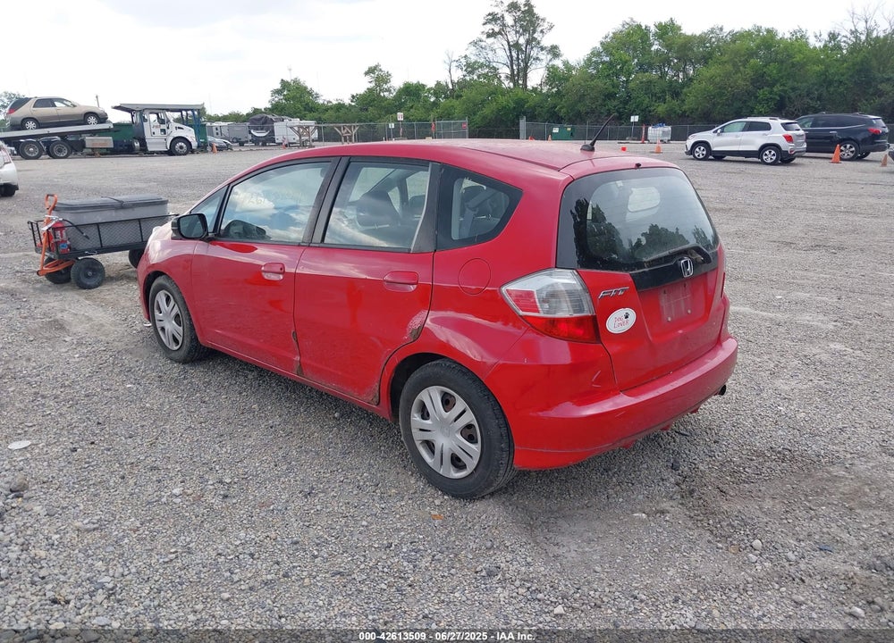 2011 HONDA FIT VIN: JHMGE8H31BS010054