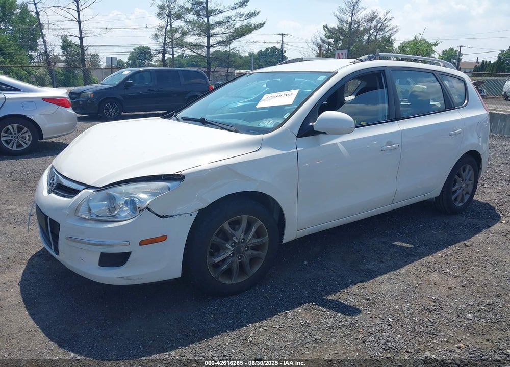 2012 HYUNDAI ELANTRA TOURING VIN: KMHDC8AE1CU133831