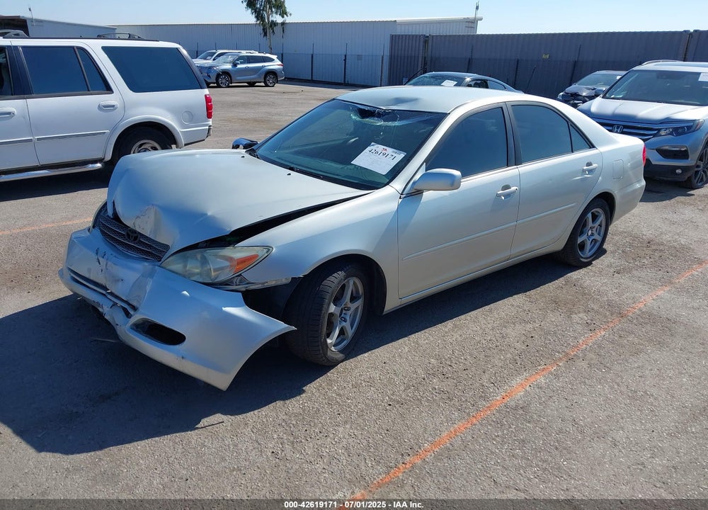 2002 TOYOTA CAMRY LE VIN: JTDBE32K020100306