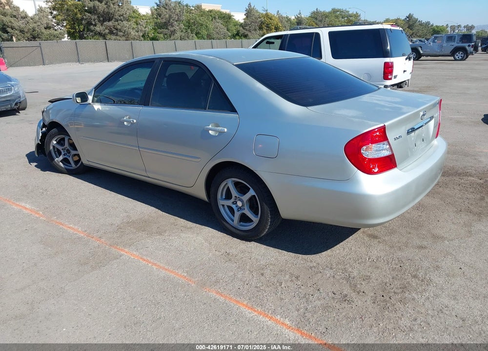 2002 TOYOTA CAMRY LE VIN: JTDBE32K020100306