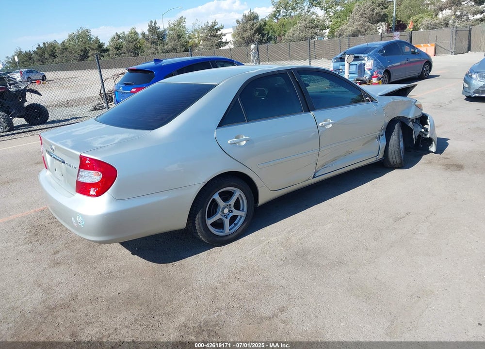 2002 TOYOTA CAMRY LE VIN: JTDBE32K020100306