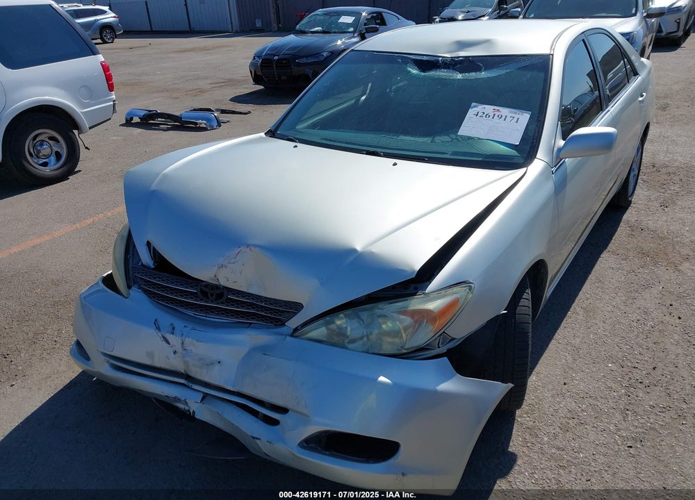 2002 TOYOTA CAMRY LE VIN: JTDBE32K020100306