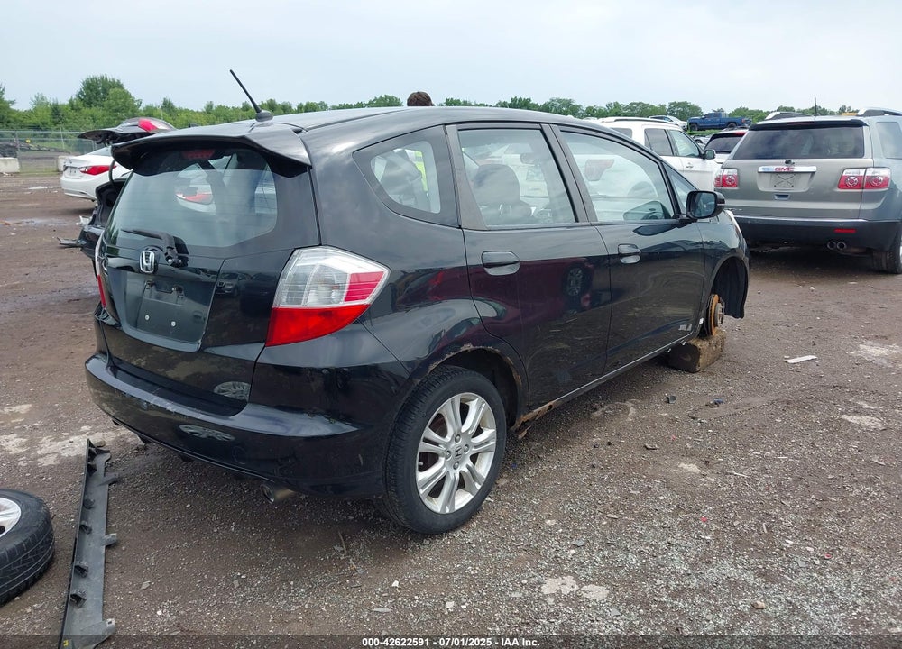 2009 HONDA FIT SPORT VIN: JHMGE88499S050093