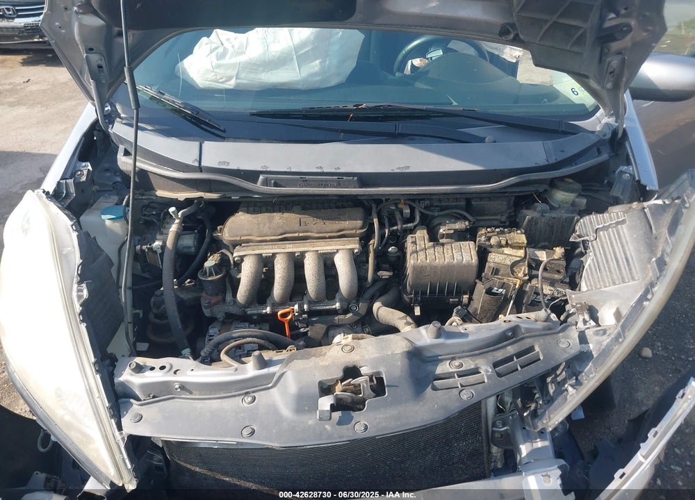 2009 HONDA FIT VIN: JHMGE88659S013897