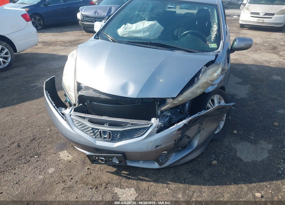 2009 HONDA FIT VIN: JHMGE88659S013897