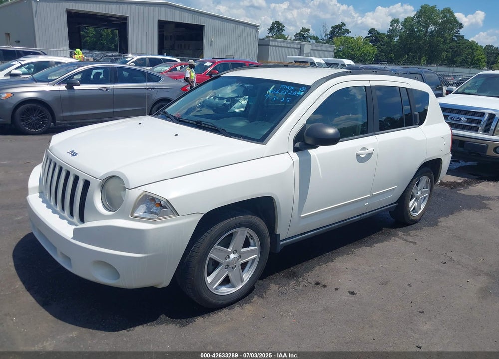 2010 JEEP COMPASS VIN: 1J4NT4FB7AD503235