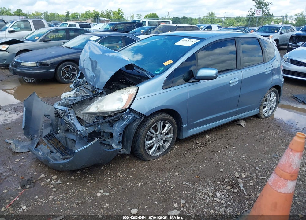 2011 HONDA FIT VIN: JHMGE8H50BC021252