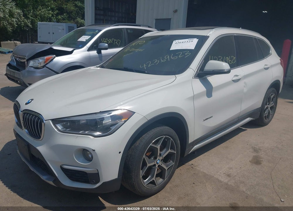 2017 BMW X1 VIN: WBXHT3Z3XH4A65599