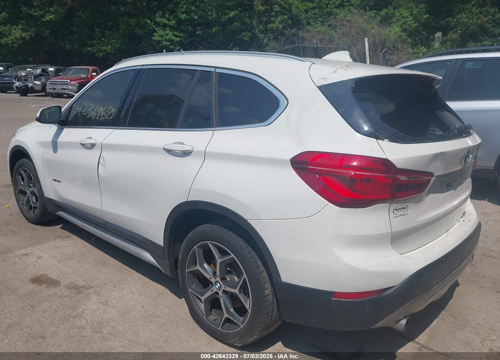 2017 BMW X1 VIN: WBXHT3Z3XH4A65599