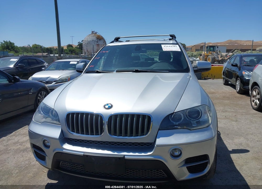2012 BMW X5 VIN: 5UXZW0C58CL671141