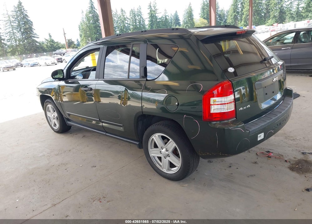 2010 JEEP COMPASS VIN: 1J4NF1FB0AD622928