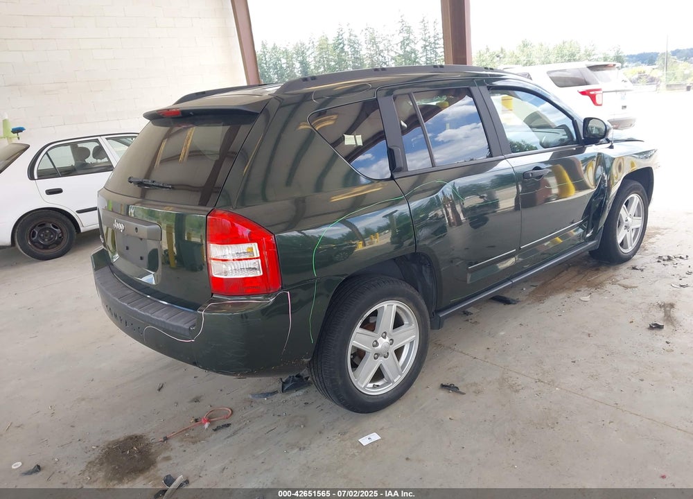 2010 JEEP COMPASS VIN: 1J4NF1FB0AD622928