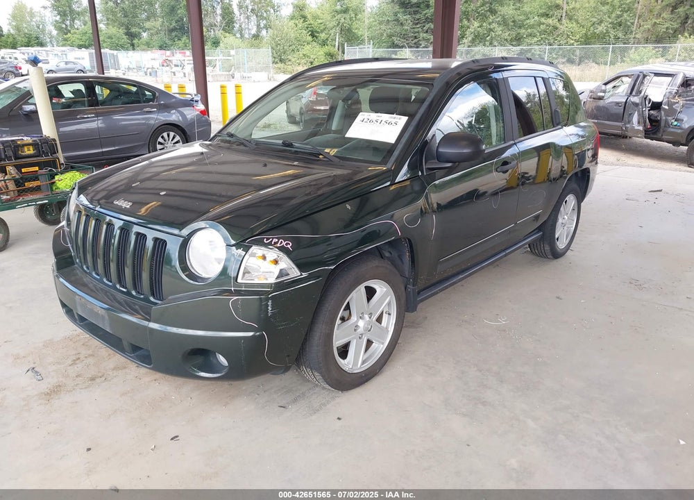 2010 JEEP COMPASS VIN: 1J4NF1FB0AD622928