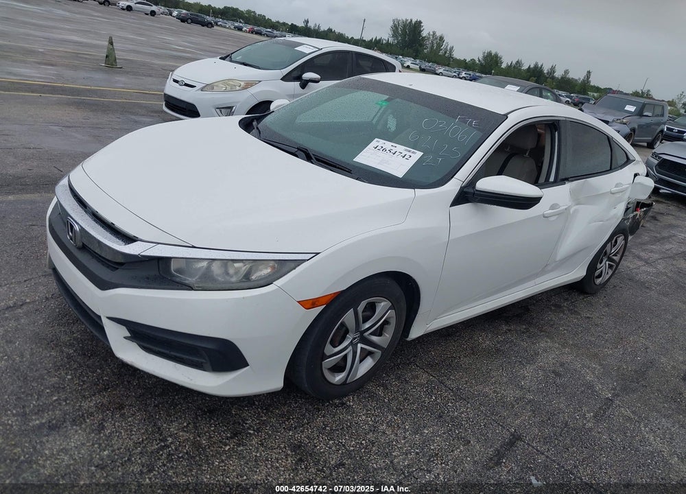 2018 HONDA CIVIC LX VIN: 19XFC2F57JE031061
