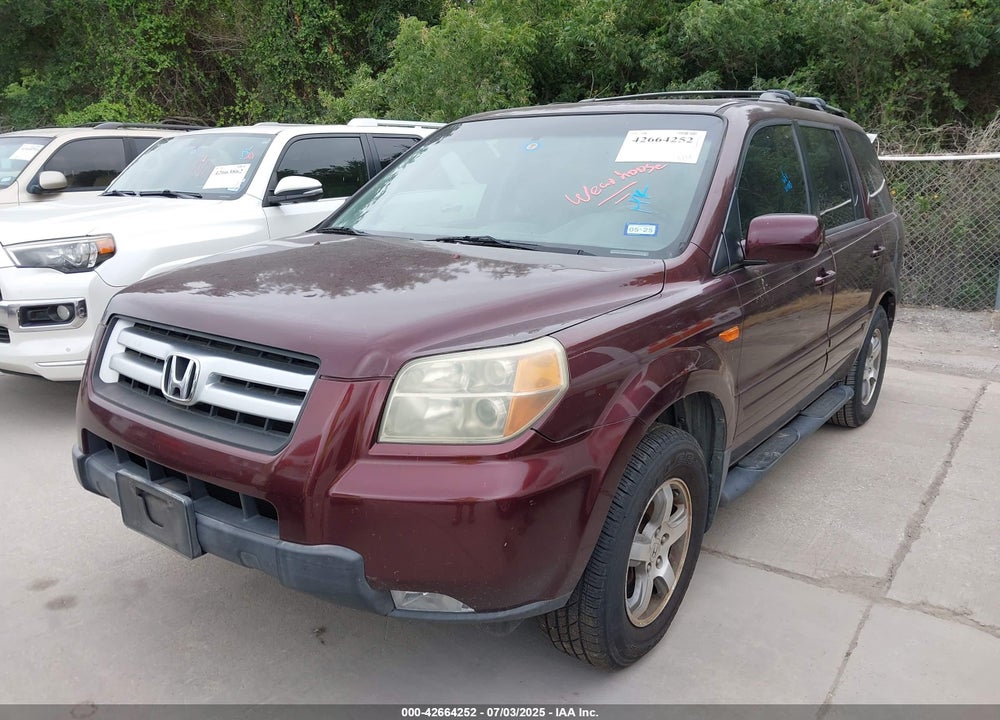 2007 HONDA PILOT EX-L VIN: 5FNYF287X7B033548