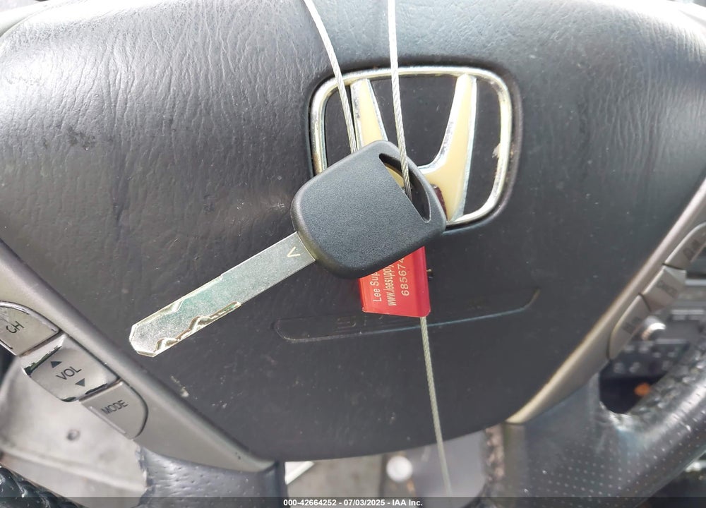 2007 HONDA PILOT EX-L VIN: 5FNYF287X7B033548