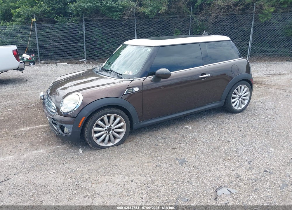 2010 MINI COOPER VIN: WMWMF3C55ATZ23127