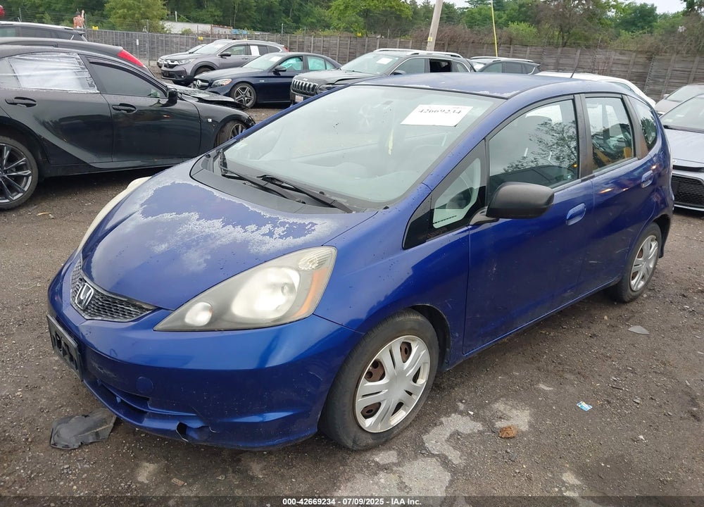 2009 HONDA FIT VIN: JHMGE88229S072855