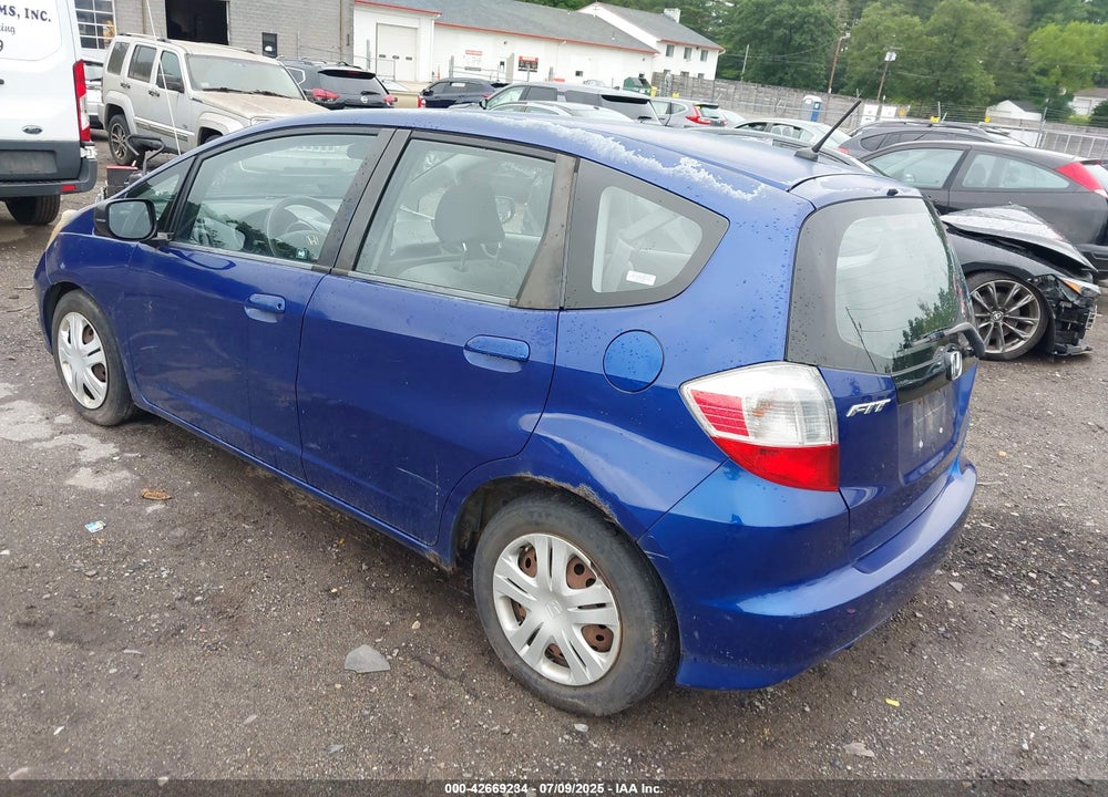 2009 HONDA FIT VIN: JHMGE88229S072855