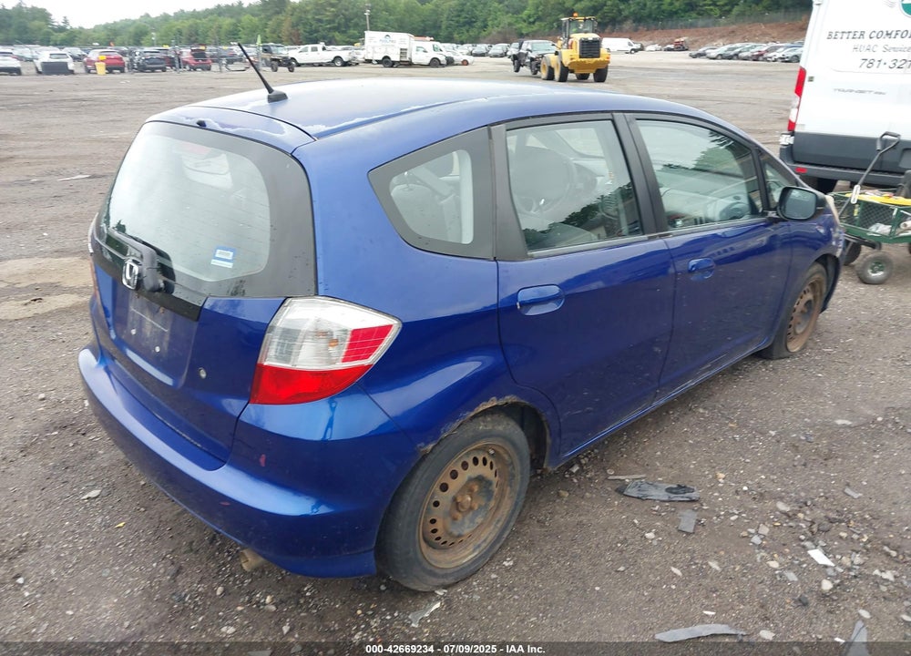 2009 HONDA FIT VIN: JHMGE88229S072855