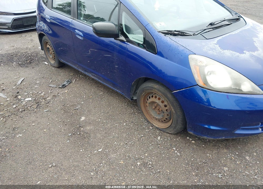2009 HONDA FIT VIN: JHMGE88229S072855
