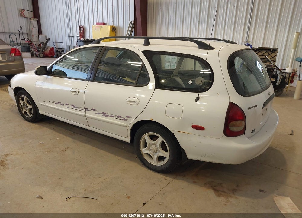 1999 HYUNDAI ELANTRA VIN: KMHJW25F5XU142550