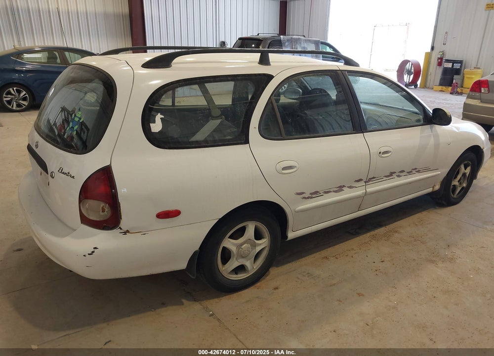 1999 HYUNDAI ELANTRA VIN: KMHJW25F5XU142550